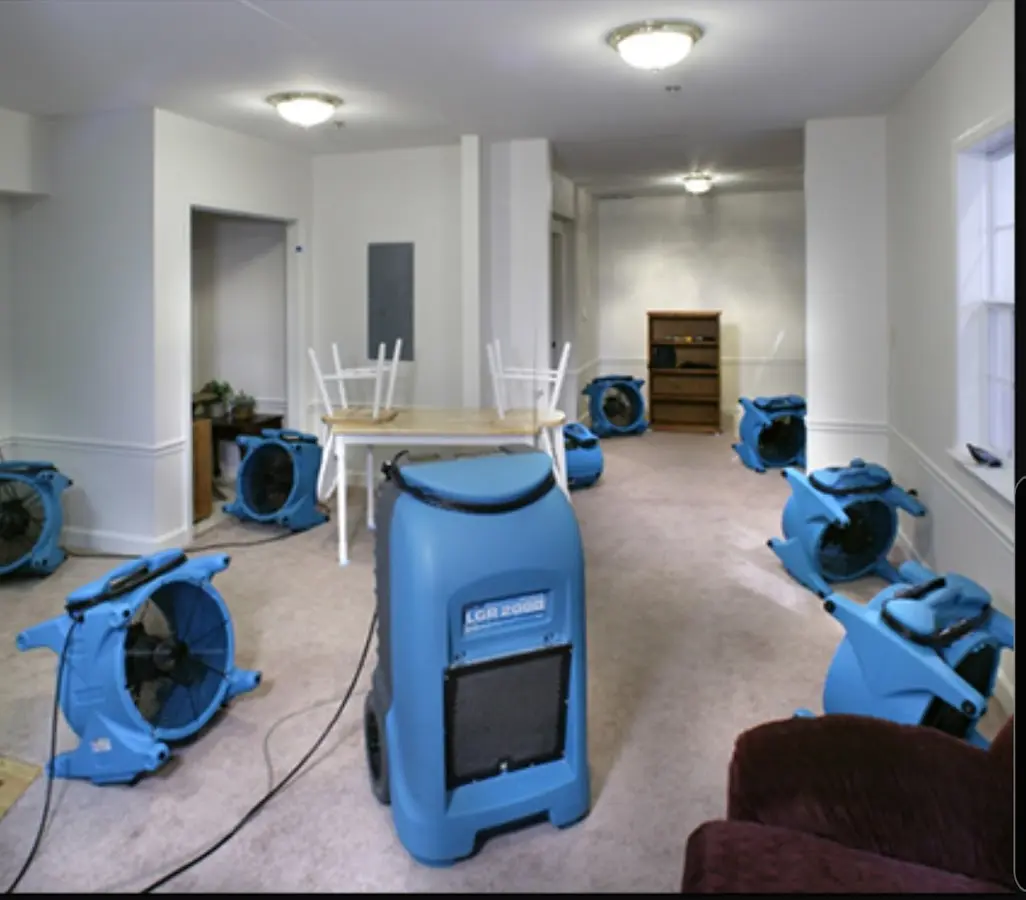 Air movers and dehumidifier setup for Water Damage Restoration in Carrollton